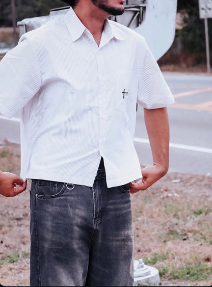 Jesus Is King Boxy Shirt, close detail — Crossway mark on the chest pocket