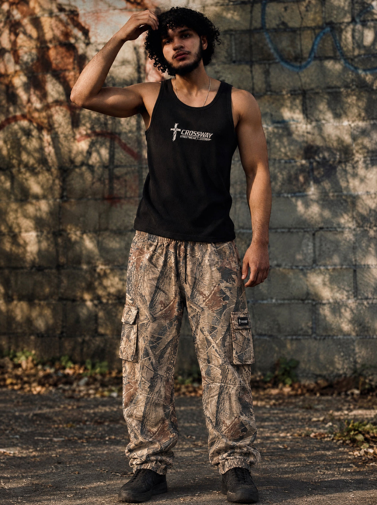 Romans 14:8 Faith Tank worn with the Crossway camo cargo sweatpants